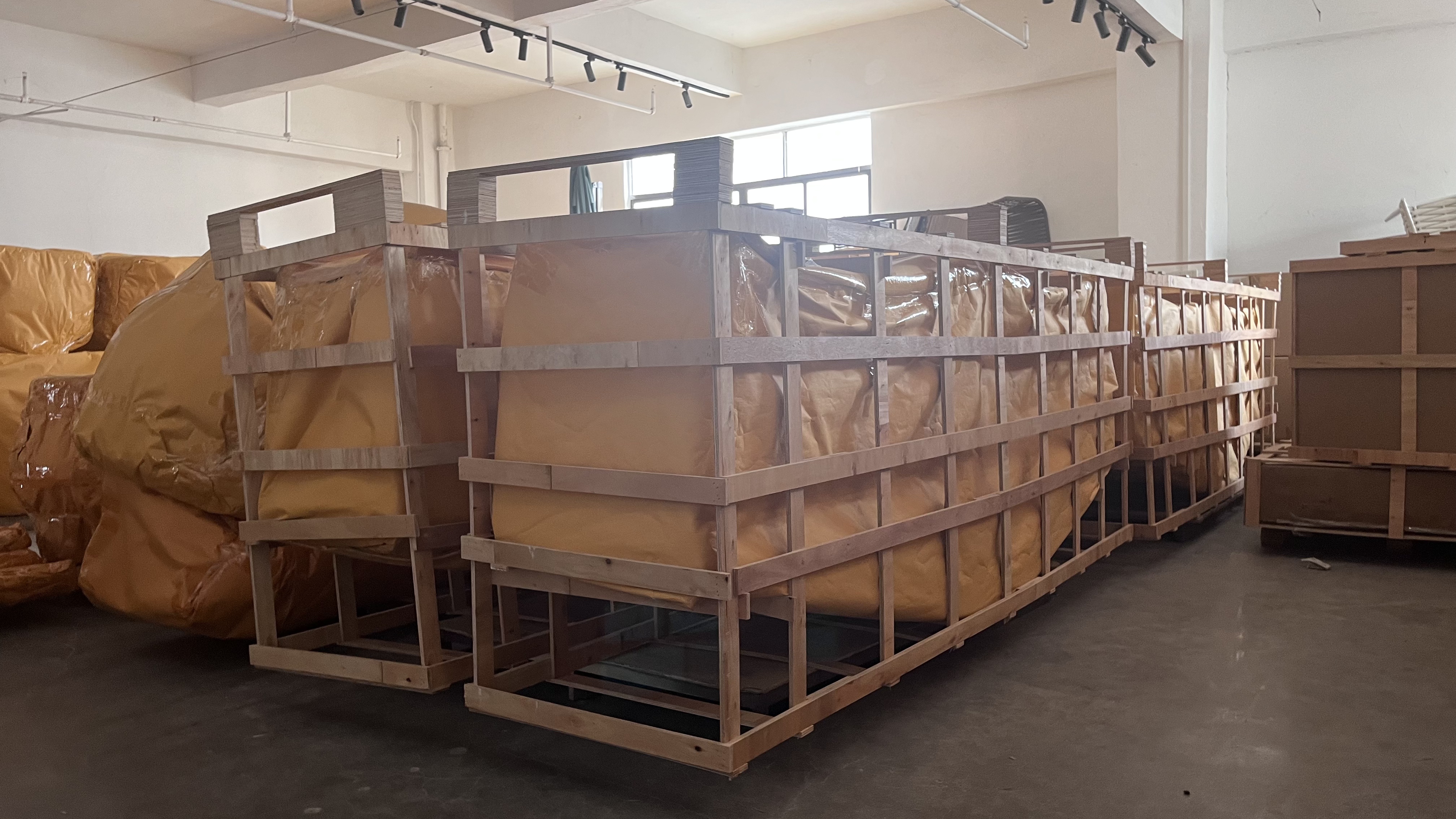 Outdoor furniture protected in wooden shipping crates