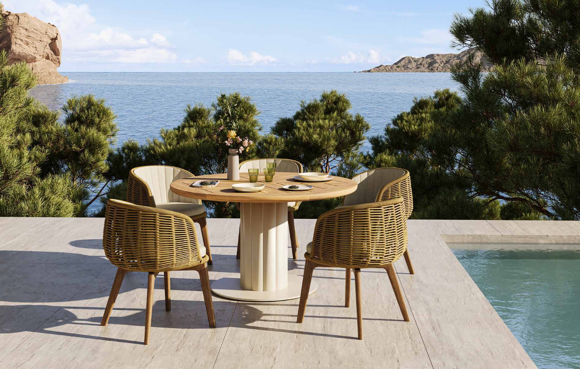 Resort dining area beside a pool and the sea