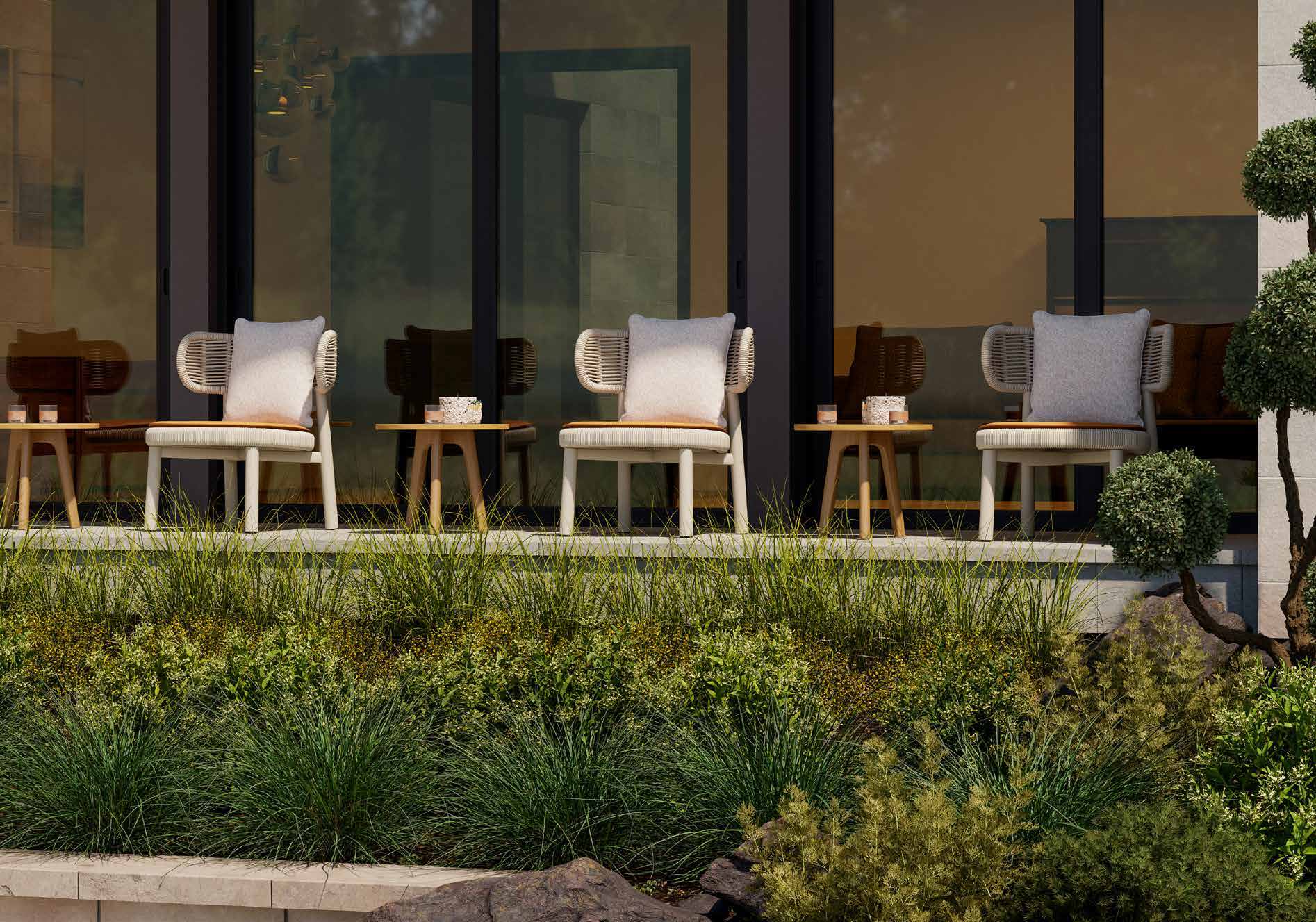 Long outdoor dining table on a coastal terrace