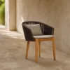 Outdoor Lounge Chair — Black 02, shown in a styled outdoor setting