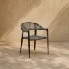 Outdoor Lounge Chair — Black 03, shown in a styled outdoor setting