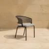 Outdoor Lounge Chair — Black 04, shown in a styled outdoor setting