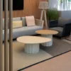 Outdoor Coffee Table — Beige 01, shown in a styled outdoor setting