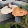 Outdoor Coffee Table — Beige 02, shown in a styled outdoor setting