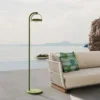 Outdoor Portable Lamp — Green 01, shown in a styled outdoor setting