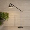 Outdoor Portable Lamp — Black 03, shown in a styled outdoor setting