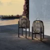 Outdoor Portable Lamp — Black 04, shown in a styled outdoor setting