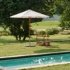 Cantilever Umbrella — Multi-color 01, shown in a styled outdoor setting