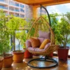 Hanging Egg Chair — Multi-color 01, shown in a styled outdoor setting