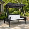Porch Swing with Canopy — Black 02, shown in a styled outdoor setting