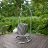 Hanging Egg Chair — Gray 01, shown in a styled outdoor setting