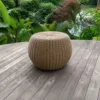 Outdoor Side Table — Brown 01, shown in a styled outdoor setting